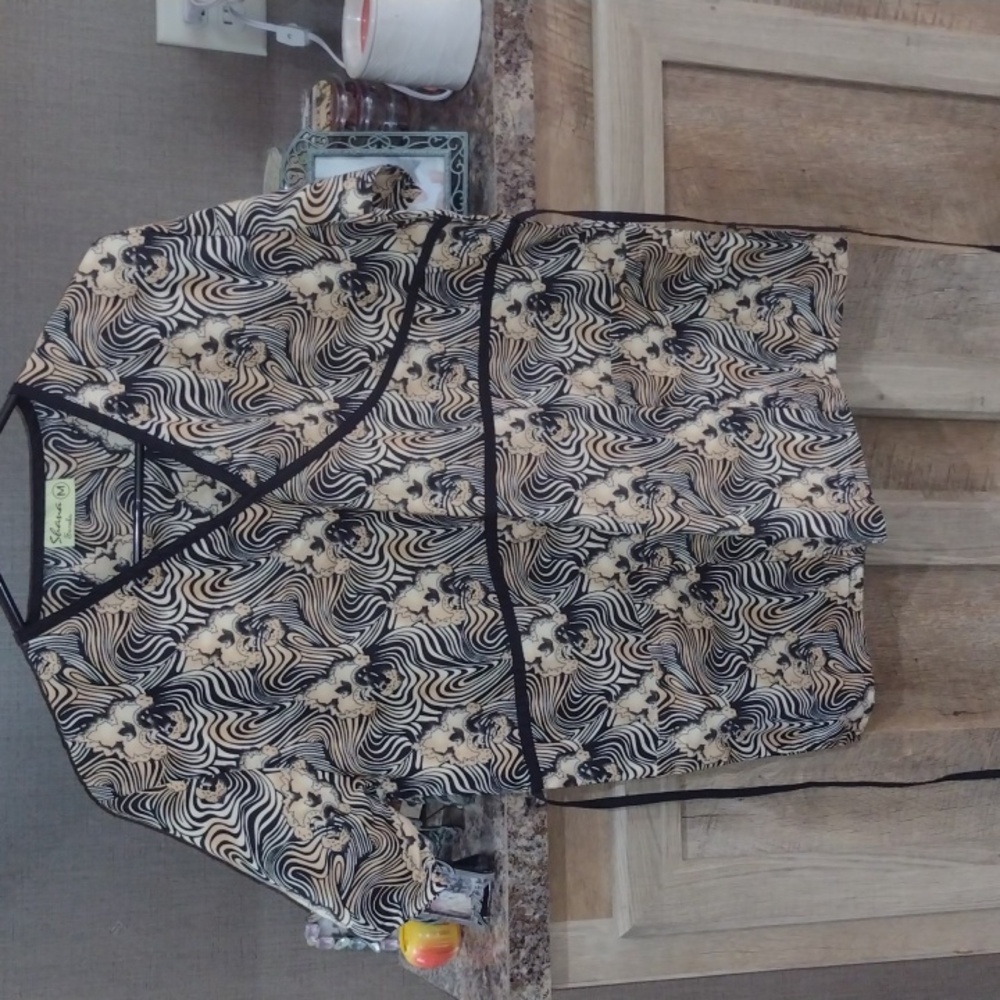 Animal print scrub top size medium